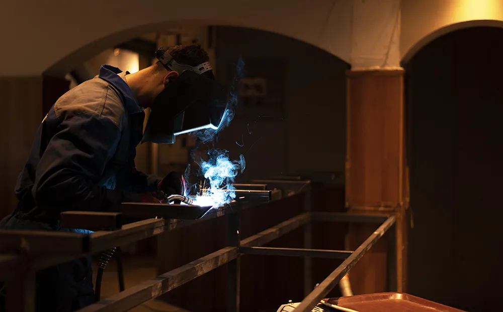 Man With Mask Welding Metal Atelier